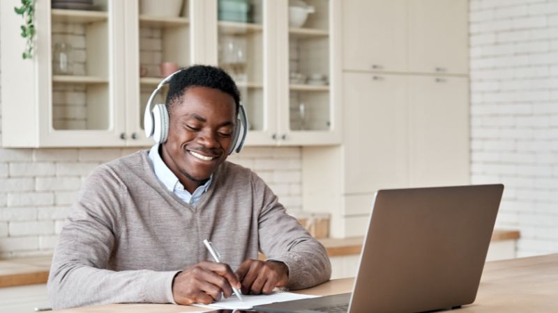 student learning online on laptop from home via LMS